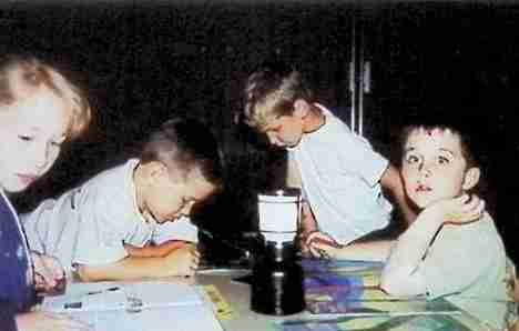 Kids around table about 2002